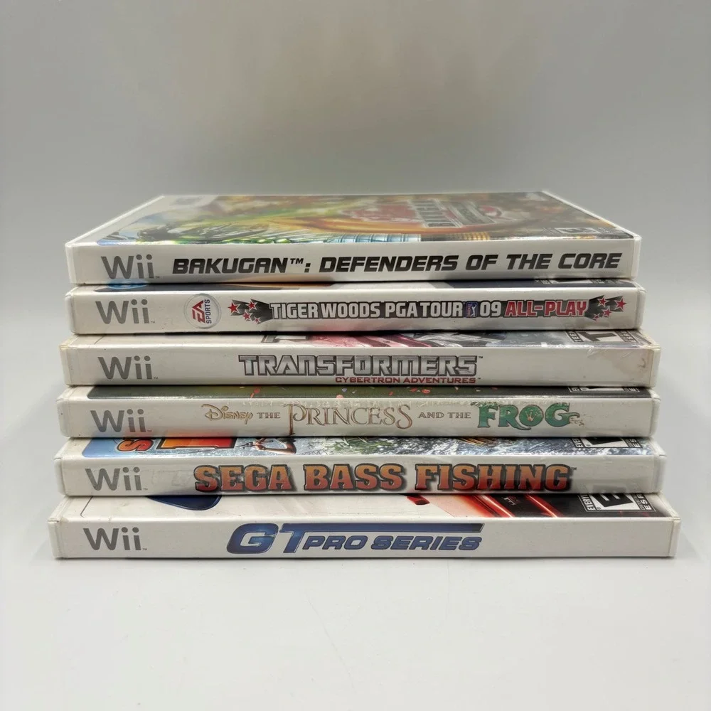 Nintendo Wii Games Bundle 6-Game Lot Various Good Bakugan Transformers Disney